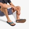 OLUKAI Ulele Men’s Beach Sandals, Water Resistant Flip Flops, Arch Support & Comfort Fit, Lightweight & Durable, Enhanced Grip & Traction(Blue Fog/Lava Rock)