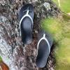 OLUKAI Ho’opio Hau Women’s Beach Sandals, Quick-Dry Flip-Flop Slides, Water Resistant Suede Lining & Wet Grip Soles, Soft Comfort Fit & Arch Support(White/Onyx)